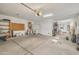 Large garage with ample storage and shelving at 6251 S Moccasin Trl, Gilbert, AZ 85298