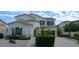Two-story house with blue shutters, landscaping, and a driveway at 6251 S Moccasin Trl, Gilbert, AZ 85298