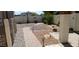 Landscaped backyard with gravel pathway and lighting at 6251 S Moccasin Trl, Gilbert, AZ 85298
