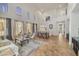 Spacious living room with high ceilings,tile floors, and ample natural light at 6251 S Moccasin Trl, Gilbert, AZ 85298