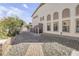 Stone pathway leads to a private backyard at 6251 S Moccasin Trl, Gilbert, AZ 85298