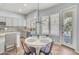 Bright kitchen with granite countertops, stainless steel appliances, and an island at 6251 S Moccasin Trl, Gilbert, AZ 85298