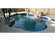 Relaxing kidney-shaped pool with waterfall feature at 6251 S Moccasin Trl, Gilbert, AZ 85298