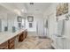 Elegant bathroom with double vanity, soaking tub, and separate shower at 6251 S Moccasin Trl, Gilbert, AZ 85298