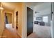 Hallway with access to living room and bedroom at 3128 E Millbrae Ln, Gilbert, AZ 85234