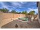 Relaxing kidney shaped pool with rock landscaping at 3128 E Millbrae Ln, Gilbert, AZ 85234