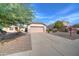 Charming curb appeal with single-story home and driveway at 3128 E Millbrae Ln, Gilbert, AZ 85234