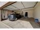Garage with automatic door opener and storage at 3128 E Millbrae Ln, Gilbert, AZ 85234