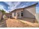 Spacious backyard featuring a patio, and pool equipment at 3128 E Millbrae Ln, Gilbert, AZ 85234