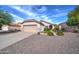 House exterior showcasing a garage and well-maintained landscaping at 3128 E Millbrae Ln, Gilbert, AZ 85234