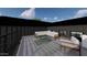 Private rooftop deck with seating area and city views at 8425 S 10Th Ln # 1, Phoenix, AZ 85041