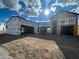 Under construction homes, showing exterior framing and garage at 8425 S 10Th Ln # 1, Phoenix, AZ 85041