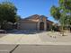 Single-story home with attached garage and landscaped front yard at 1270 E Chelsea Dr, San Tan Valley, AZ 85140