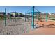 Modern playground with climbing structures and soft surface at 34475 N Fortini Way, Queen Creek, AZ 85144