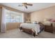 Spacious bedroom with a queen-size bed and access to backyard at 7363 W Park St, Laveen, AZ 85339