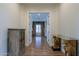 Elegant hallway with hardwood floors and decorative accents at 10512 E Cortez Dr, Scottsdale, AZ 85259