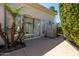 Private outdoor shower with glass block walls next to the house at 10512 E Cortez Dr, Scottsdale, AZ 85259