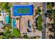 Aerial view of home with pool, tennis and basketball court at 10512 E Cortez Dr, Scottsdale, AZ 85259