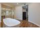 Elegant bathroom with a free-standing bathtub and double vanity at 10512 E Cortez Dr, Scottsdale, AZ 85259
