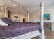 Luxurious Primary bedroom with a large four-poster bed and plenty of space at 10512 E Cortez Dr, Scottsdale, AZ 85259