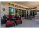 Spacious patio with seating and dining areas, offering access to the backyard at 10512 E Cortez Dr, Scottsdale, AZ 85259