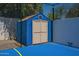 Blue storage shed with double doors at 10512 E Cortez Dr, Scottsdale, AZ 85259