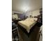 Large bedroom with king-size bed and ample closet space at 4255 N 67Th Ln, Phoenix, AZ 85033