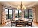Sunlit dining room featuring a round table and scenic views at 10719 E Rimrock Dr, Scottsdale, AZ 85255