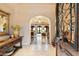 Elegant entryway with a view into a spacious living area at 10719 E Rimrock Dr, Scottsdale, AZ 85255