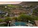 Aerial view of house and pool, with surrounding landscape at 10719 E Rimrock Dr, Scottsdale, AZ 85255