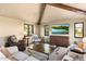 Relaxing Gathering room with exposed beams and a cozy atmosphere at 10719 E Rimrock Dr, Scottsdale, AZ 85255