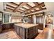 Open kitchen boasting a large island, custom cabinetry, and high-end finishes at 10719 E Rimrock Dr, Scottsdale, AZ 85255