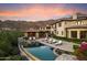 Luxury estate with a large pool and mountain views at 10719 E Rimrock Dr, Scottsdale, AZ 85255