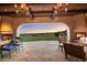 Spacious patio with seating and dining areas, featuring sunset views at 10719 E Rimrock Dr, Scottsdale, AZ 85255