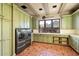 Spacious laundry room with ample storage and modern appliances at 10719 E Rimrock Dr, Scottsdale, AZ 85255