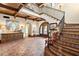 Stunning entryway with a grand staircase and ornate details at 10719 E Rimrock Dr, Scottsdale, AZ 85255