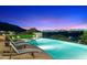 Stunning infinity pool with city views and spa at 10719 E Rimrock Dr, Scottsdale, AZ 85255