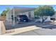 Mobile home with carport and landscaping at 7750 E Broadway Rd # 10, Mesa, AZ 85208
