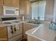 Efficient kitchen with ample counter space and cabinets at 7750 E Broadway Rd # 10, Mesa, AZ 85208