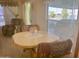 Small dining area with a round table and four chairs at 7750 E Broadway Rd # 10, Mesa, AZ 85208
