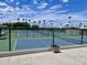 Well-maintained tennis courts with surrounding fencing at 7750 E Broadway Rd # 10, Mesa, AZ 85208
