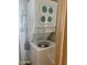 Stackable washer and dryer in a compact laundry closet at 7750 E Broadway Rd # 10, Mesa, AZ 85208