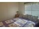 Relaxing bedroom with a double bed and floral decor at 7750 E Broadway Rd # 10, Mesa, AZ 85208