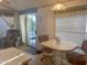 Small dining area with table and chairs near sliding glass door at 7750 E Broadway Rd # 10, Mesa, AZ 85208