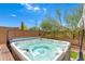 Clean hot tub with a cover in a backyard setting at 9985 E Legend Ct, Gold Canyon, AZ 85118