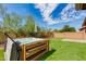 Relaxing hot tub on a wooden deck in the backyard at 9985 E Legend Ct, Gold Canyon, AZ 85118