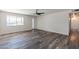 Bright and airy living room with laminate wood flooring at 3708 E Joan De Arc Ave, Phoenix, AZ 85032