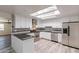 Modern kitchen with stainless steel appliances and granite countertops at 3708 E Joan De Arc Ave, Phoenix, AZ 85032