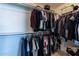Spacious walk-in closet with ample hanging and shelving space at 14760 W Riviera Dr, Surprise, AZ 85379