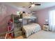 Charming bedroom with bunk beds and a modern dresser at 14760 W Riviera Dr, Surprise, AZ 85379
